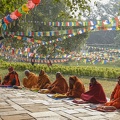 Monks_praying_at_Maya_Devi_temple_birth_place_of_Buddha_in_Lumbini.jpg