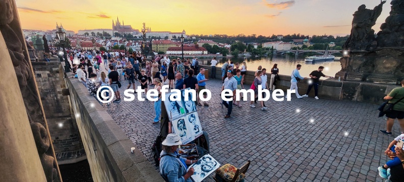 People walking on Charles bridge at Prague